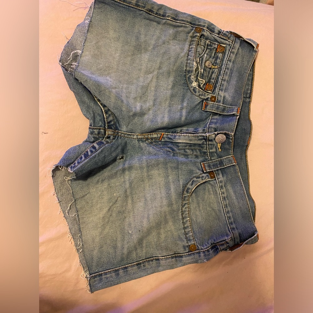True Religion booty shirts size 30